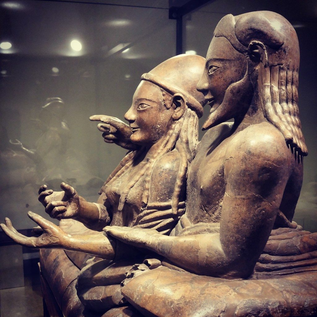 Sarcophagus of the Spouses. Etruscan, late 6th century BCE. Made of terracotta which was one brightly painted, depicting a married couple at a banquet together on the afterlife. Their smiling and friendly posture is typical for Etruscan art, very different from Greek styles. The Etruscans cremated their dead, so instead of bodies this sarcophagus would have contained the couple's ashes. Seen during our Rome visit.