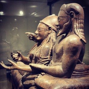 Sarcophagus of the Spouses. Etruscan, late 6th century BCE. Made of terracotta which was one brightly painted, depicting a married couple at a banquet together on the afterlife. Their smiling and friendly posture is typical for Etruscan art, very different from Greek styles. The Etruscans cremated their dead, so instead of bodies this sarcophagus would have contained the couple's ashes. Seen during our Rome visit.